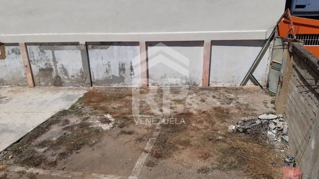 SGT-146 Terreno en Venta con Bienhechuria en Tucacas
