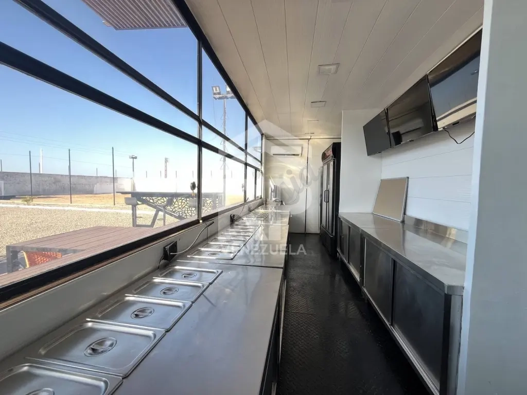 SGT-147 Terreno cercado con Locales Comerciales en Venta o Alquiler